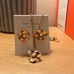 Kate spade flower earrings and pendant set.